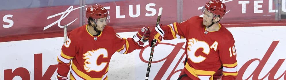 Matthew Tkachuk, Johnny Gaudreau and Sean Monahan of the Calgary