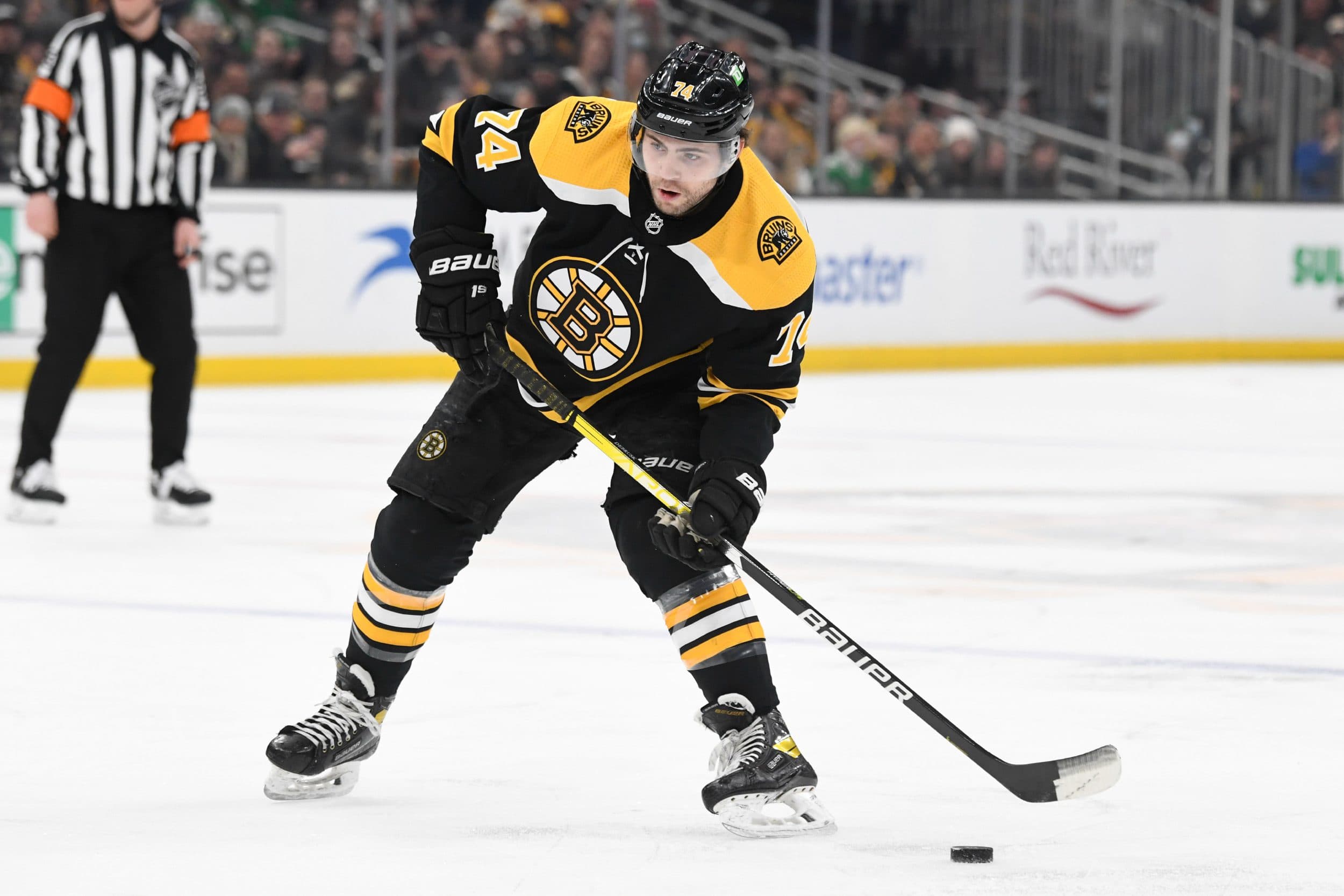 Jake DeBrusk Boston Bruins Autographed 16″ x 20″ Black Alternate Jersey  Skating Photograph with “Boston's Team” Inscription – Limited Edition of 20