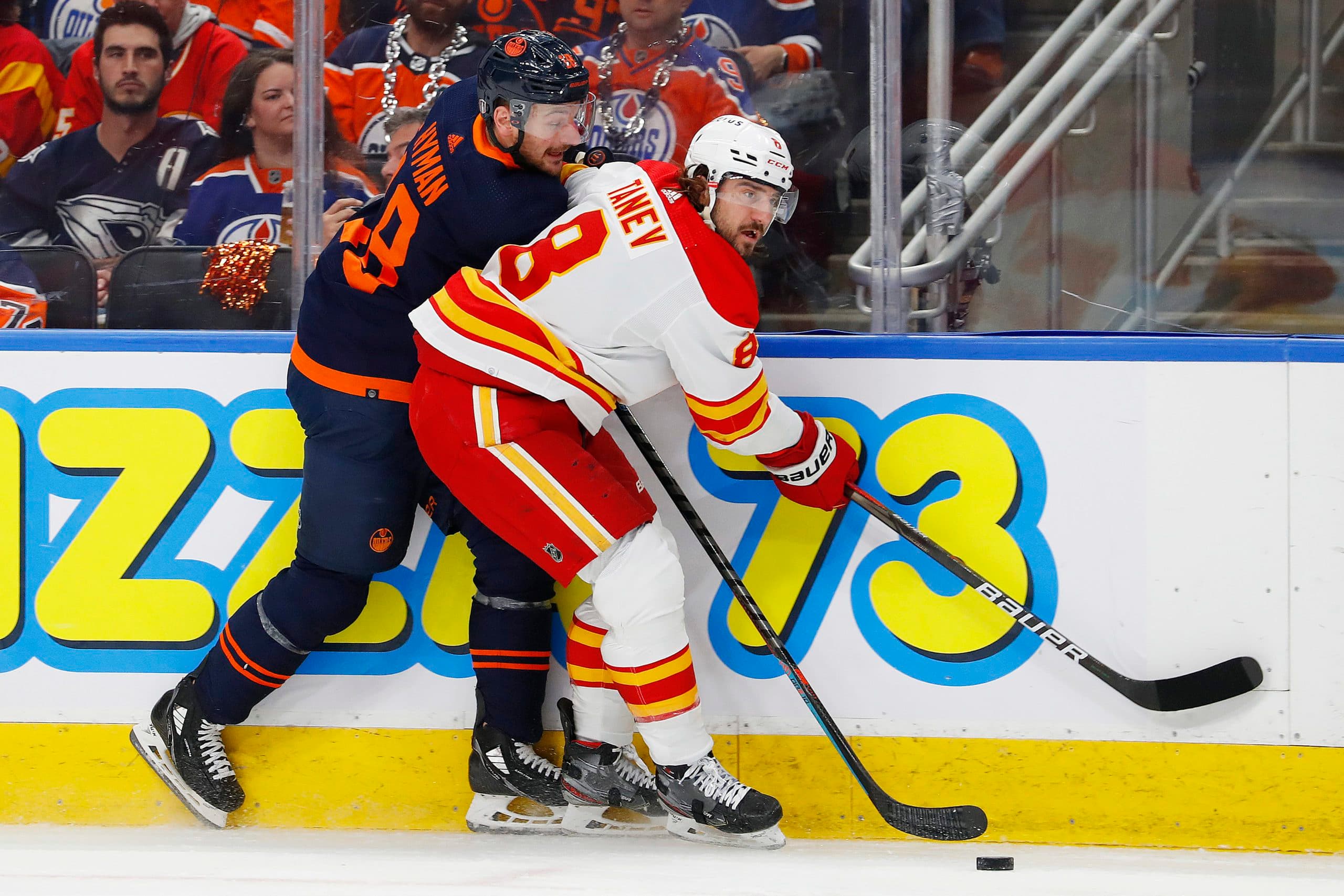 Canadiens' Cole Caufield leaves game against Flames after hit from Lewis