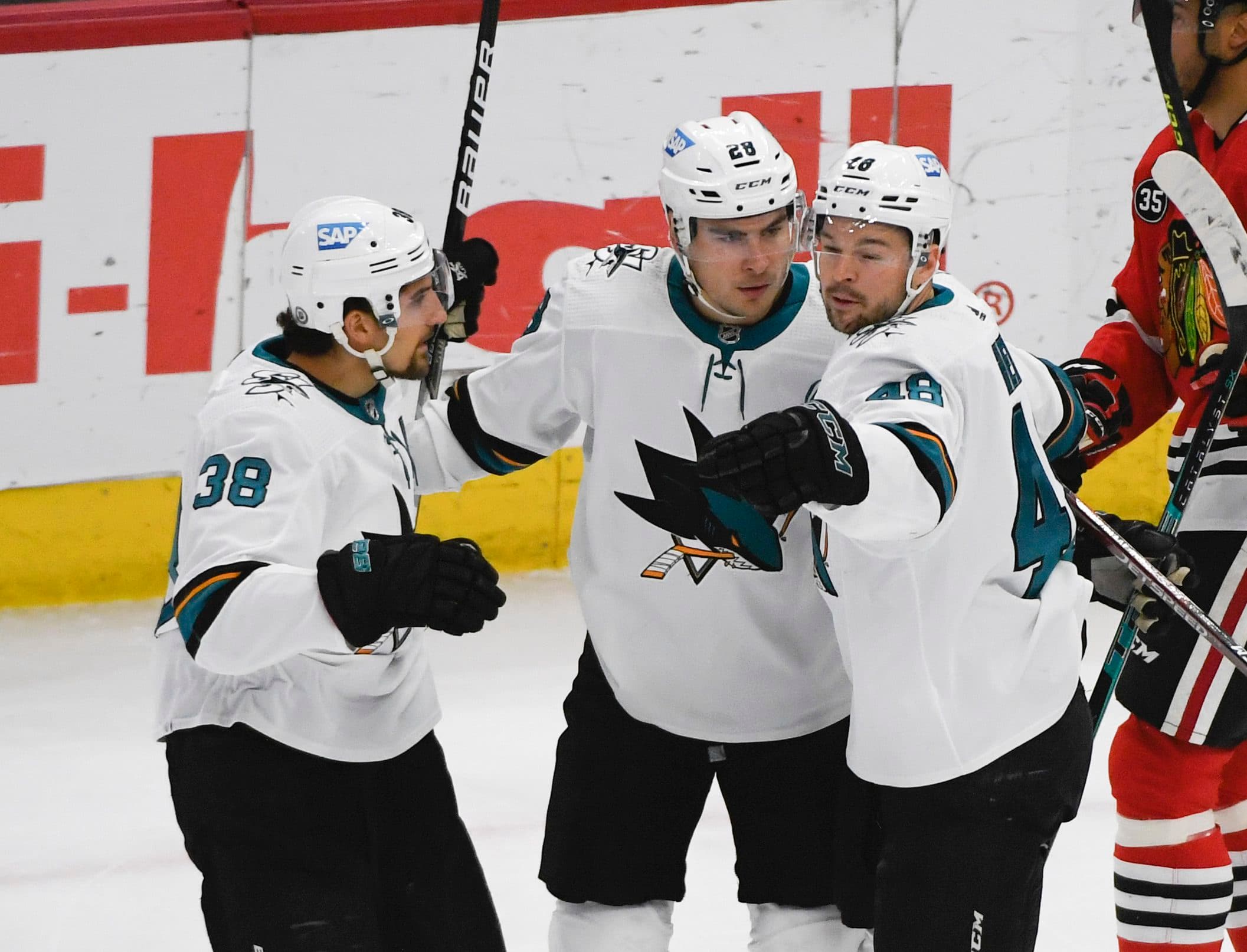 Mike Grier of the San Jose Sharks skates against the New Jersey