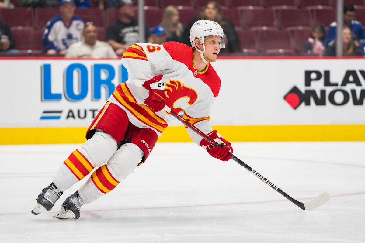 Flames' Rooney clears waivers, Zohorna recalled