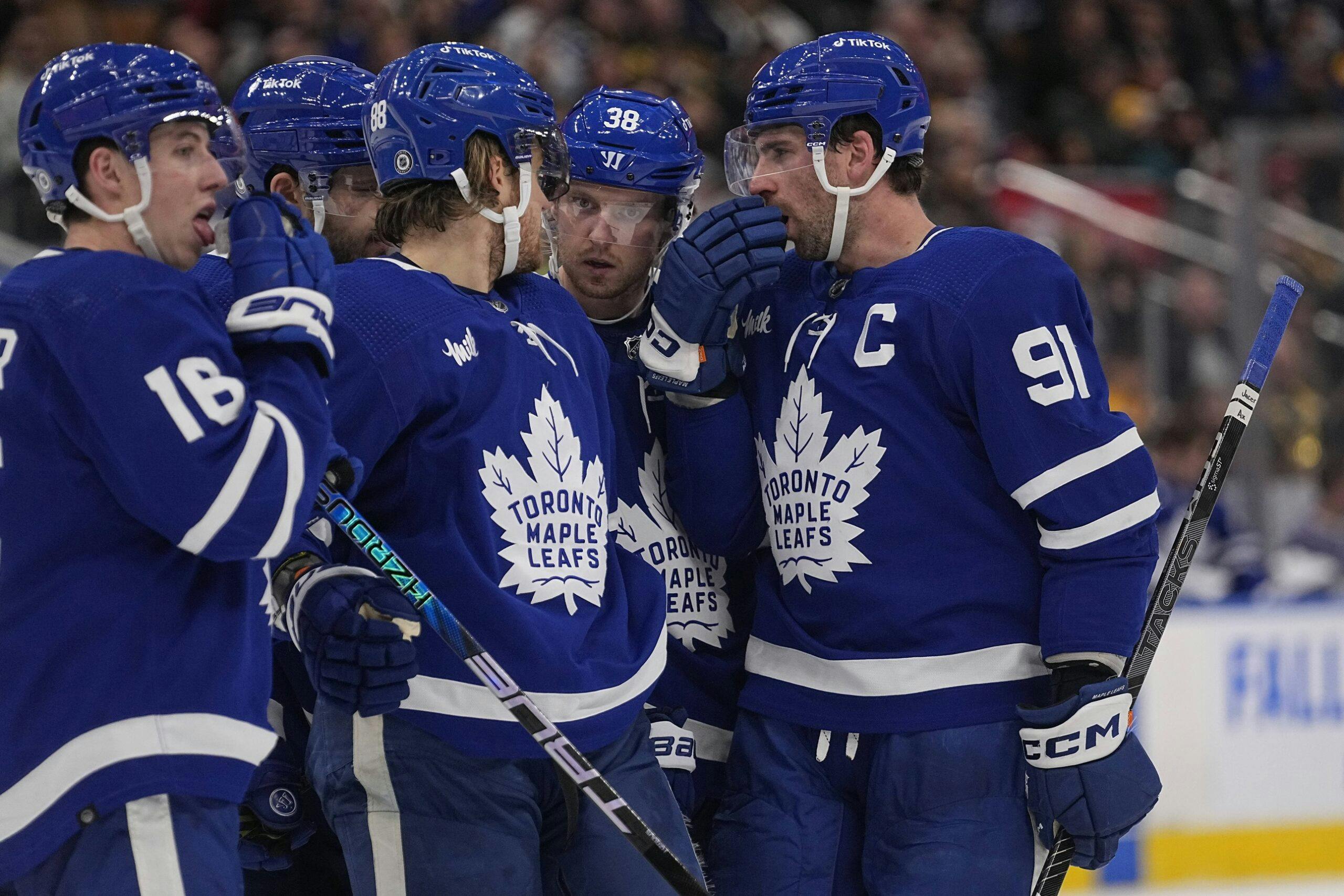 Which players who have played for both Toronto Maple Leafs and New
