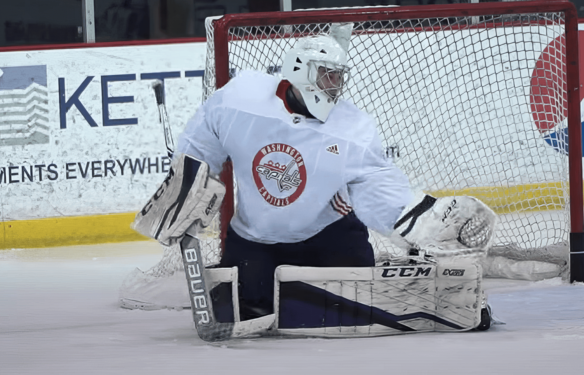 Goalie Charlie Lindgren of the Washington Capitals cannot make a