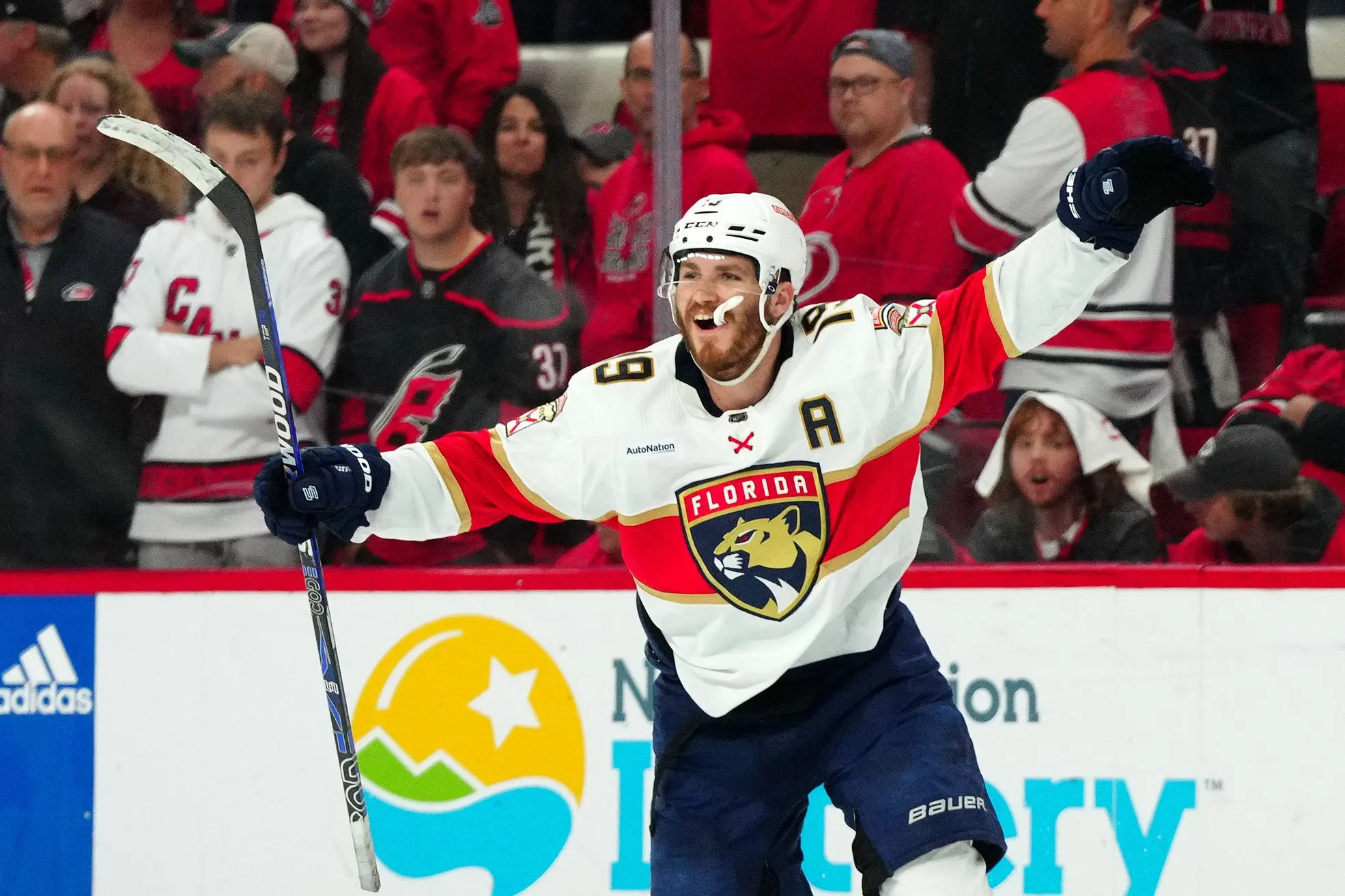 Quick, post pictures of Saint Perry hoisting Stanley Cup to