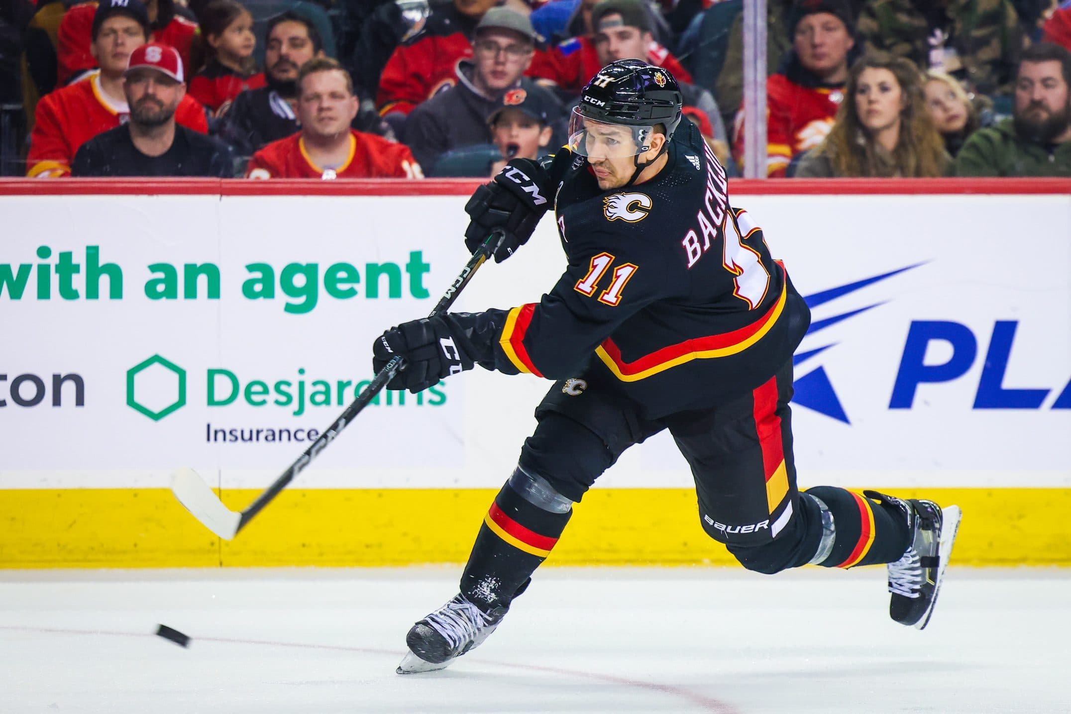 Calgary Flames forward Mikael Backlund wins King Clancy Memorial Trophy