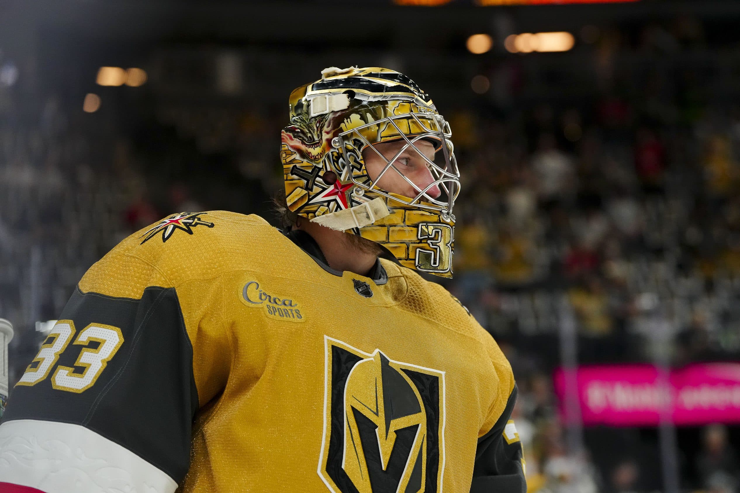 Vegas Golden Knights' Nick Cousins, left, gets past Calgary Flames