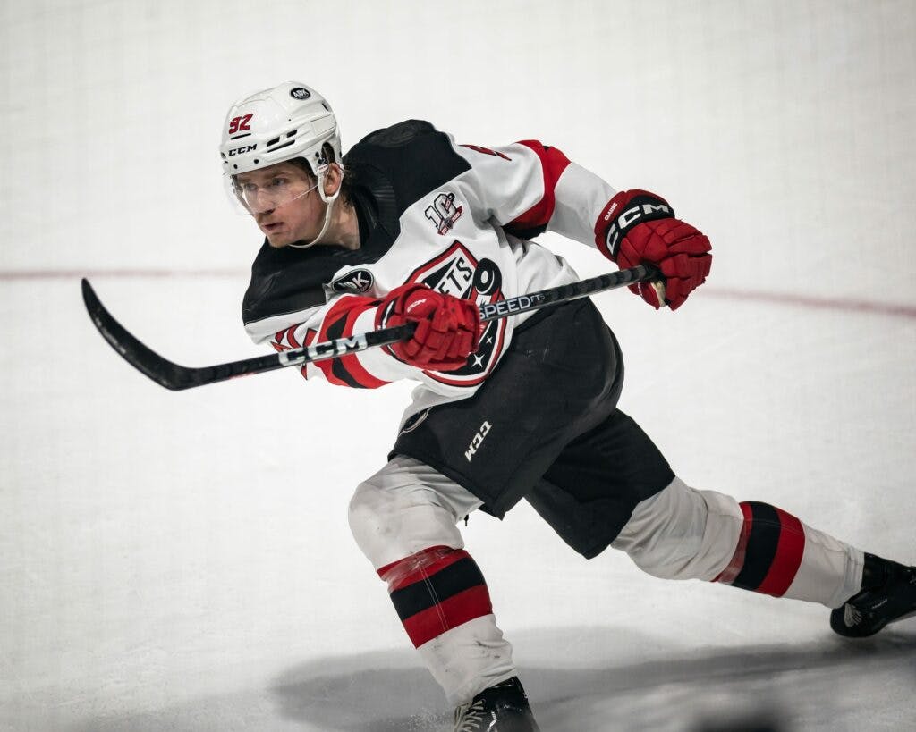 New Jersey Devils forward Cam Squires takes the ice during New
