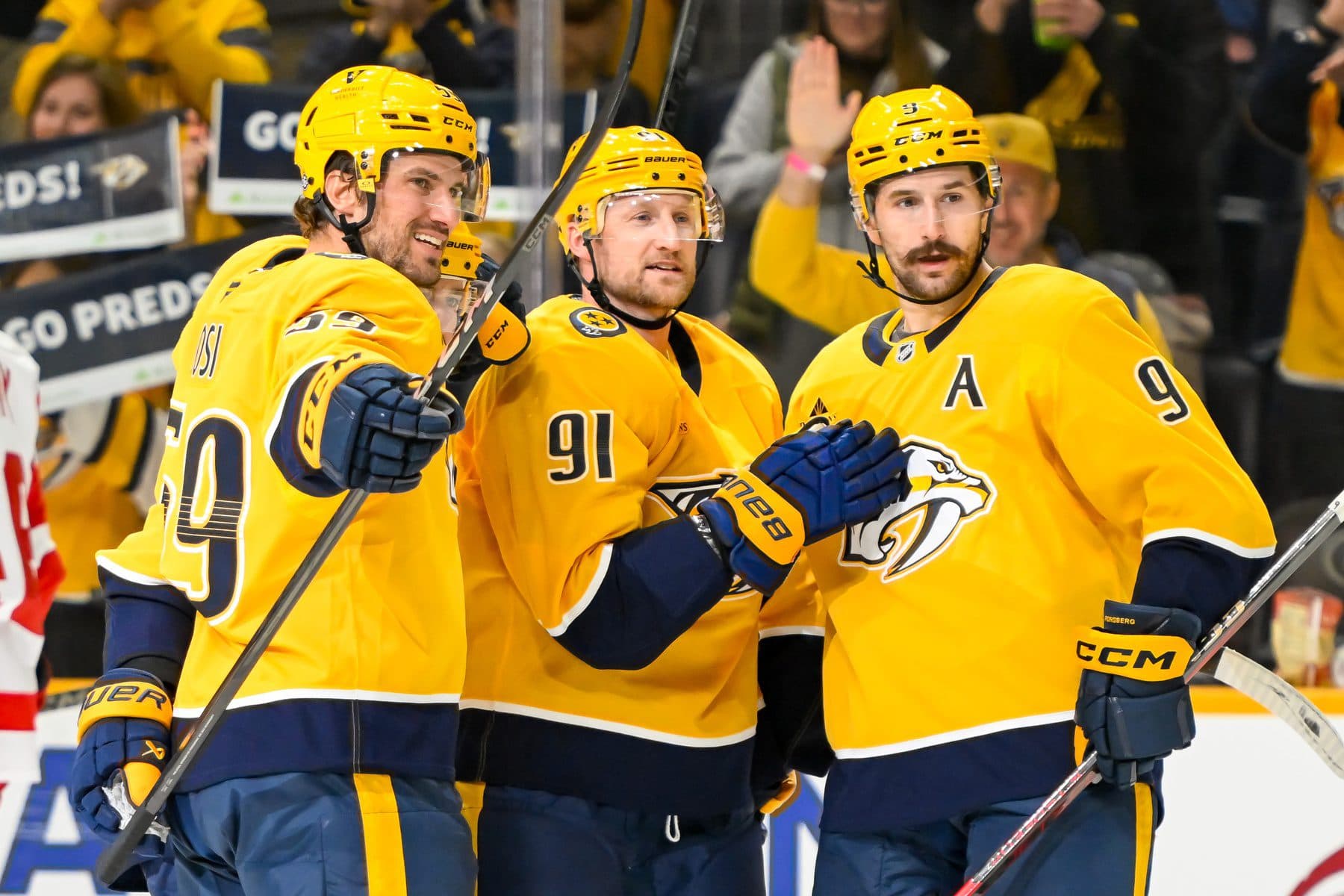 Nashville Predators center Steven Stamkos (91) celebrates his goal with his teammates against the Detroit Red Wings during the third period at Bridgestone Arena.