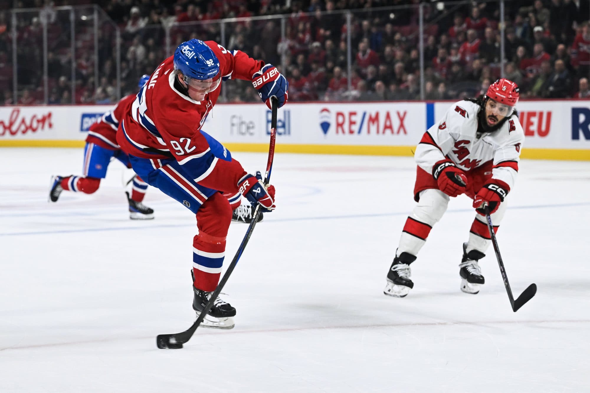 Montreal Canadiens right wing Patrik Laine (92) shoots the puck against the Carolina Hurricanes in the third period at Bell Centre.