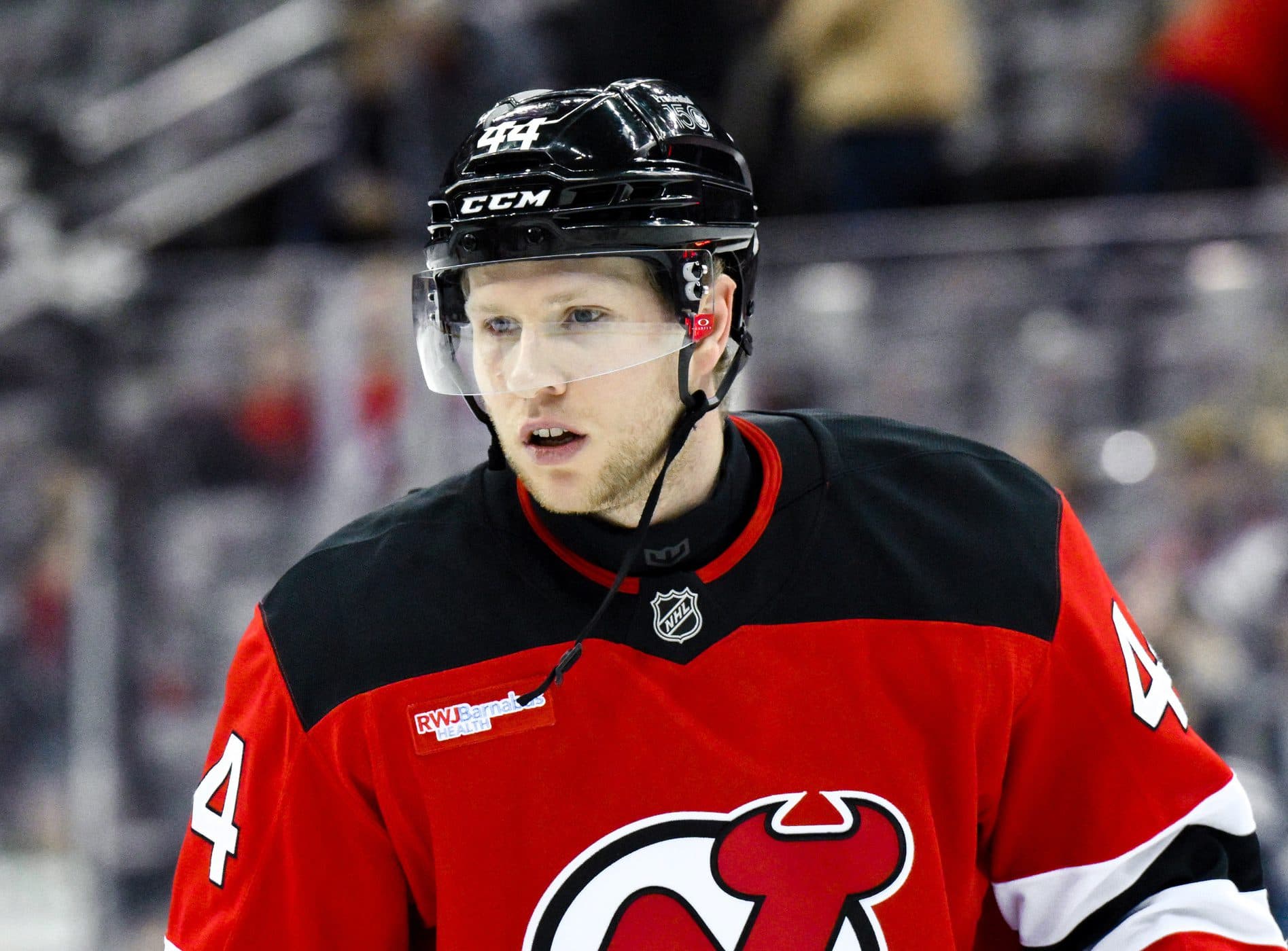 New Jersey Devils defenseman Dennis Cholowski (44) warms up before a game against the Vancouver Canucks at Prudential Center.
