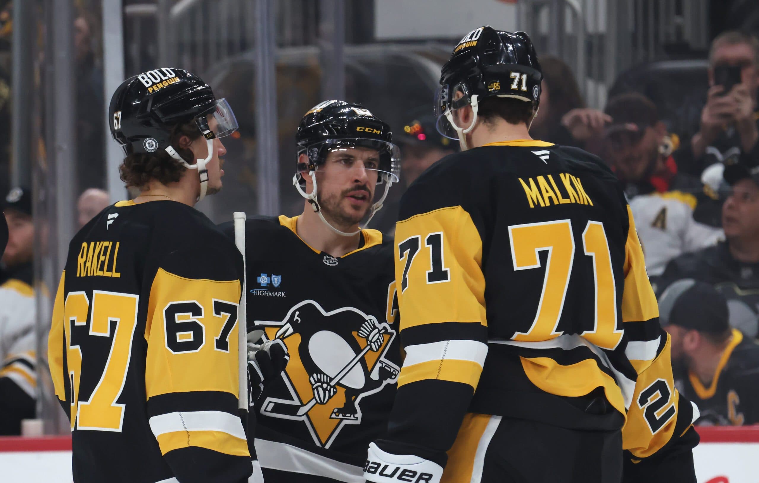 Rickard Rakell, Sidney Crosby and Evgeni Malkin