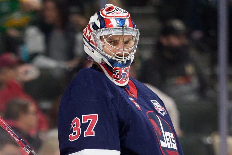Winnipeg Jets goaltender Connor Hellebuyck (37) watches players line up for the faceoff in the second period against the Minnesota Wild at Grand Casino Arena.
