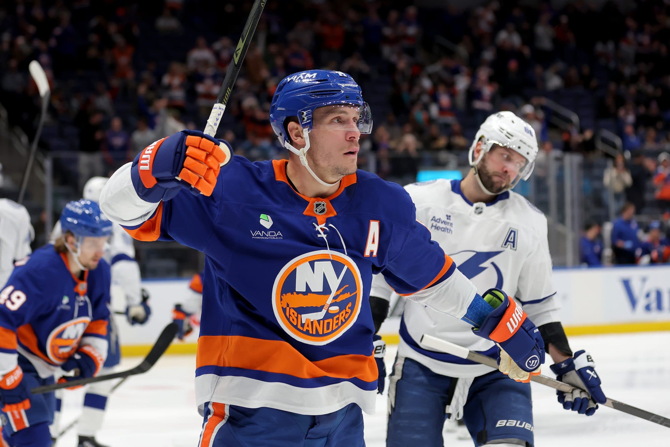 New York Islanders center Bo Horvat (14) celebrates his goal against the Tampa Bay Lightning during the second period at UBS Arena.