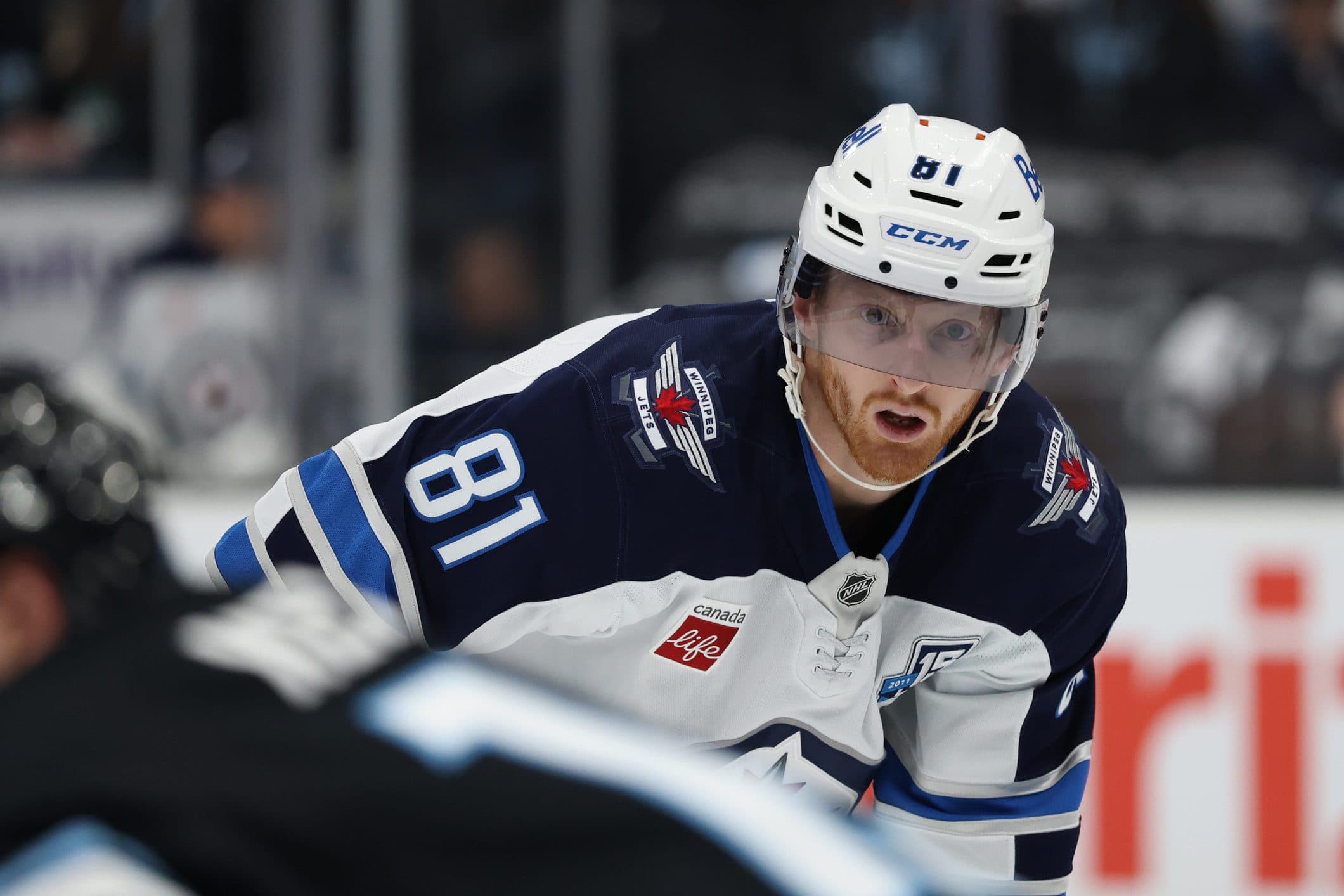 Winnipeg Jets left wing Kyle Connor (81) waits for the face-off against the Utah Mammoth during the second period at Delta Center.