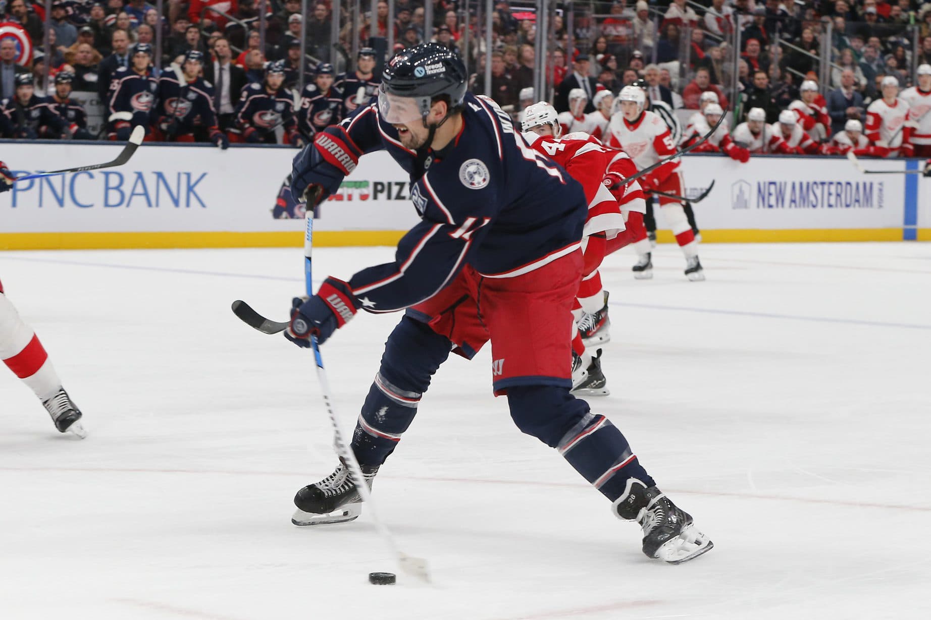 Columbus Blue Jackets left wing Miles Wood (11) wrists a shot on goal against the Detroit Red Wings during the second period at Nationwide Arena.