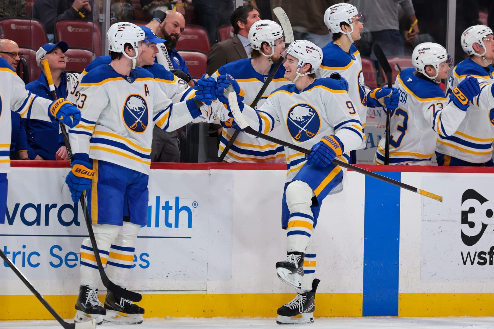 Buffalo Sabres right wing Josh Doan (91) celebrates with defenseman Mattias Samuelsson (23) after scoring against the Florida Panthers during the third period at Amerant Bank Arena.