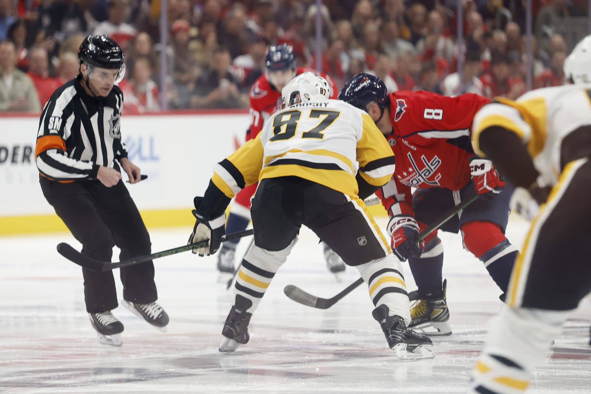 Pittsburgh Penguins center Sidney Crosby (87) and Washington Capitals left wing Alex Ovechkin (8) take the opening face-off at Capital One Arena.