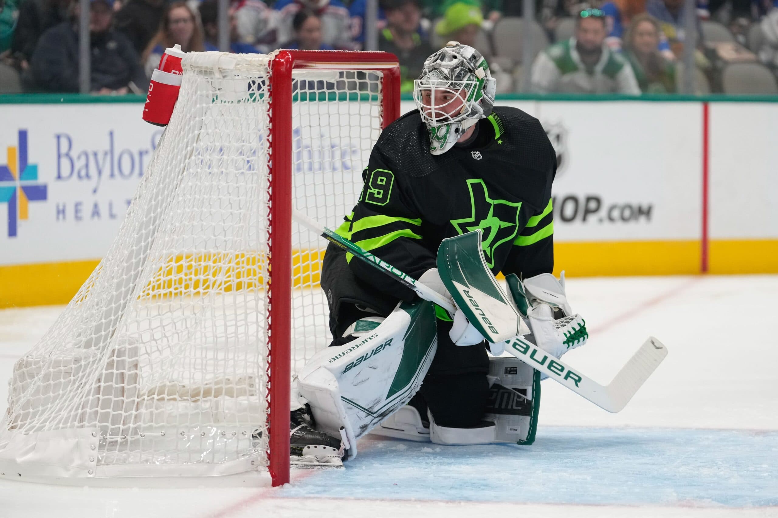 Dallas Stars goaltender Scott Wedgewood leaves Thursday's game on