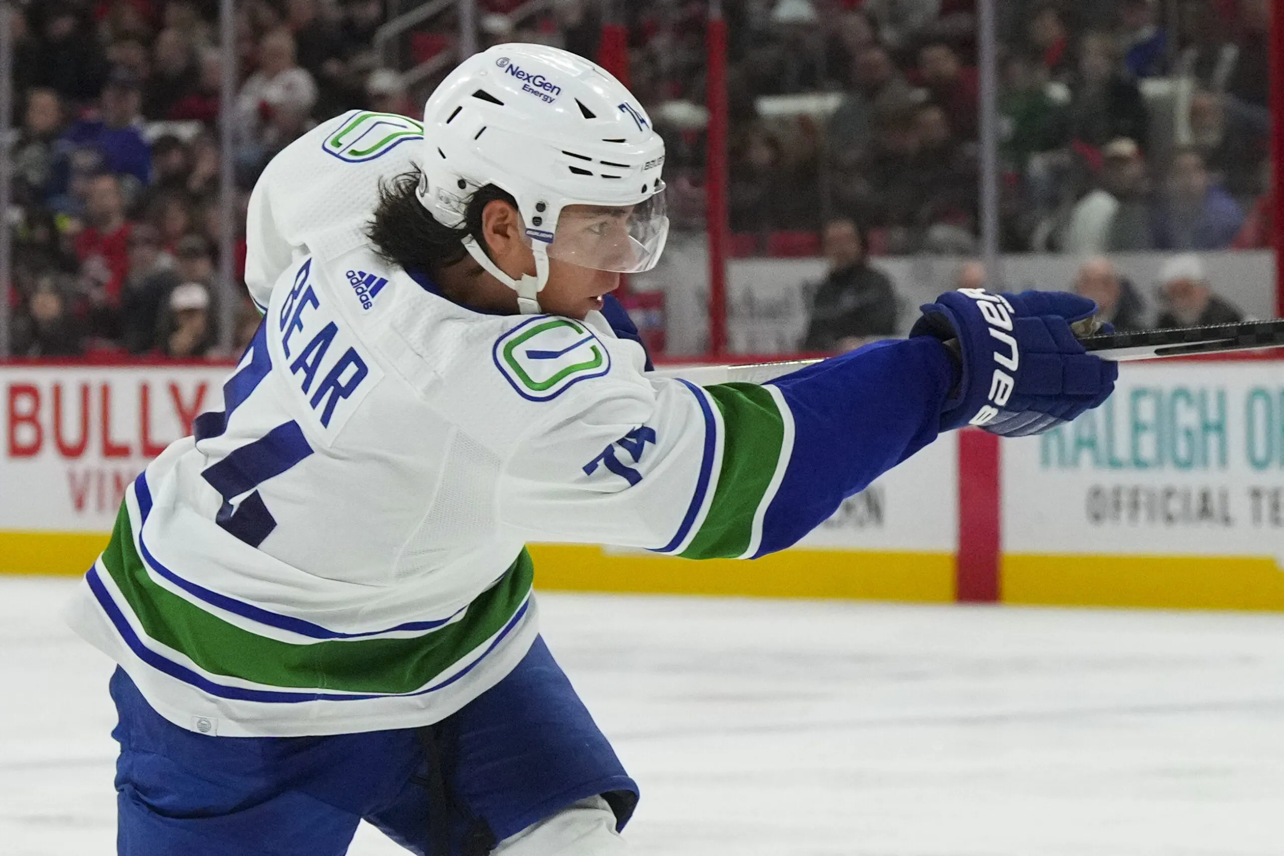 Ethan Bear leaves Vancouver Canucks game with upper-body injury