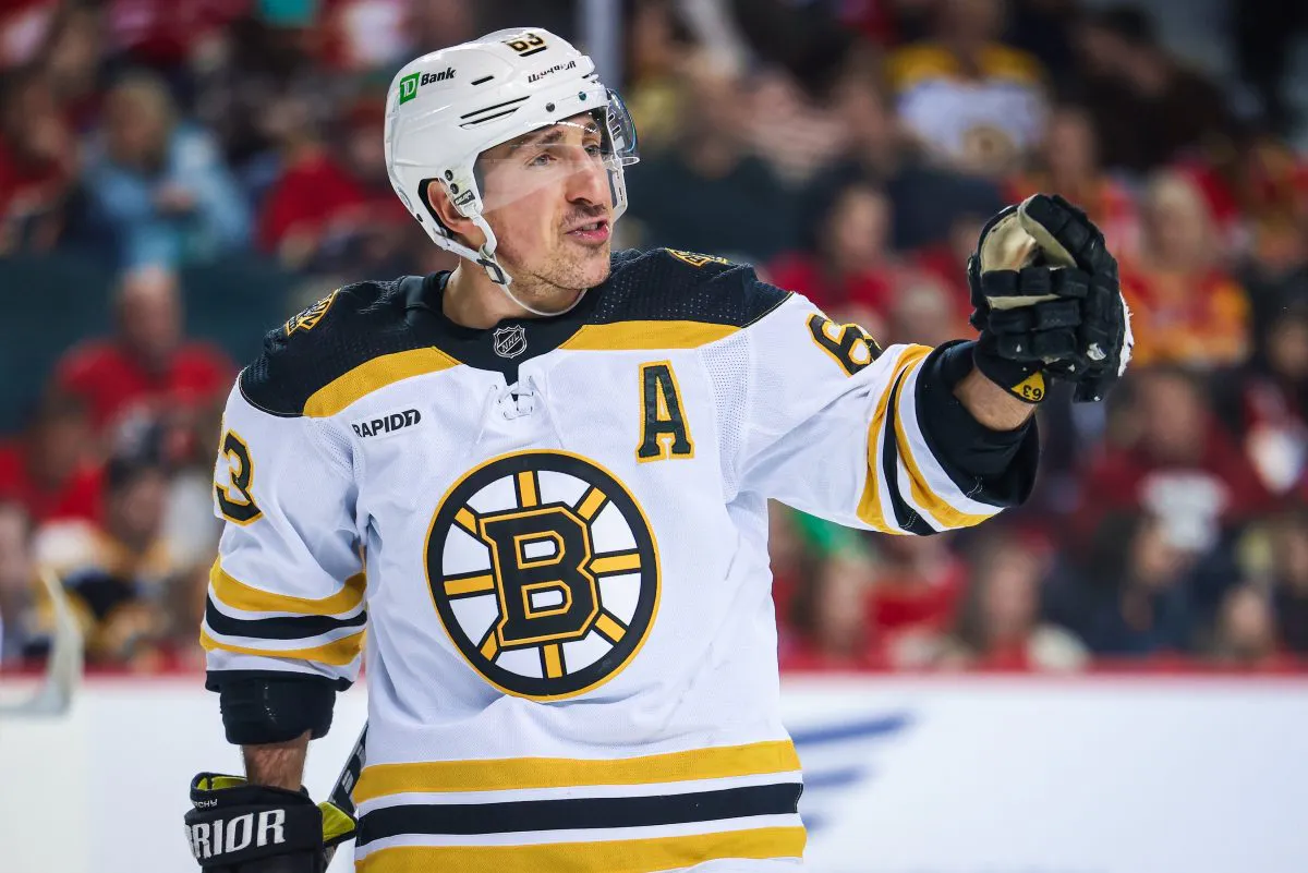 Brad Marchand exits Boston Bruins victory with lower-body injury