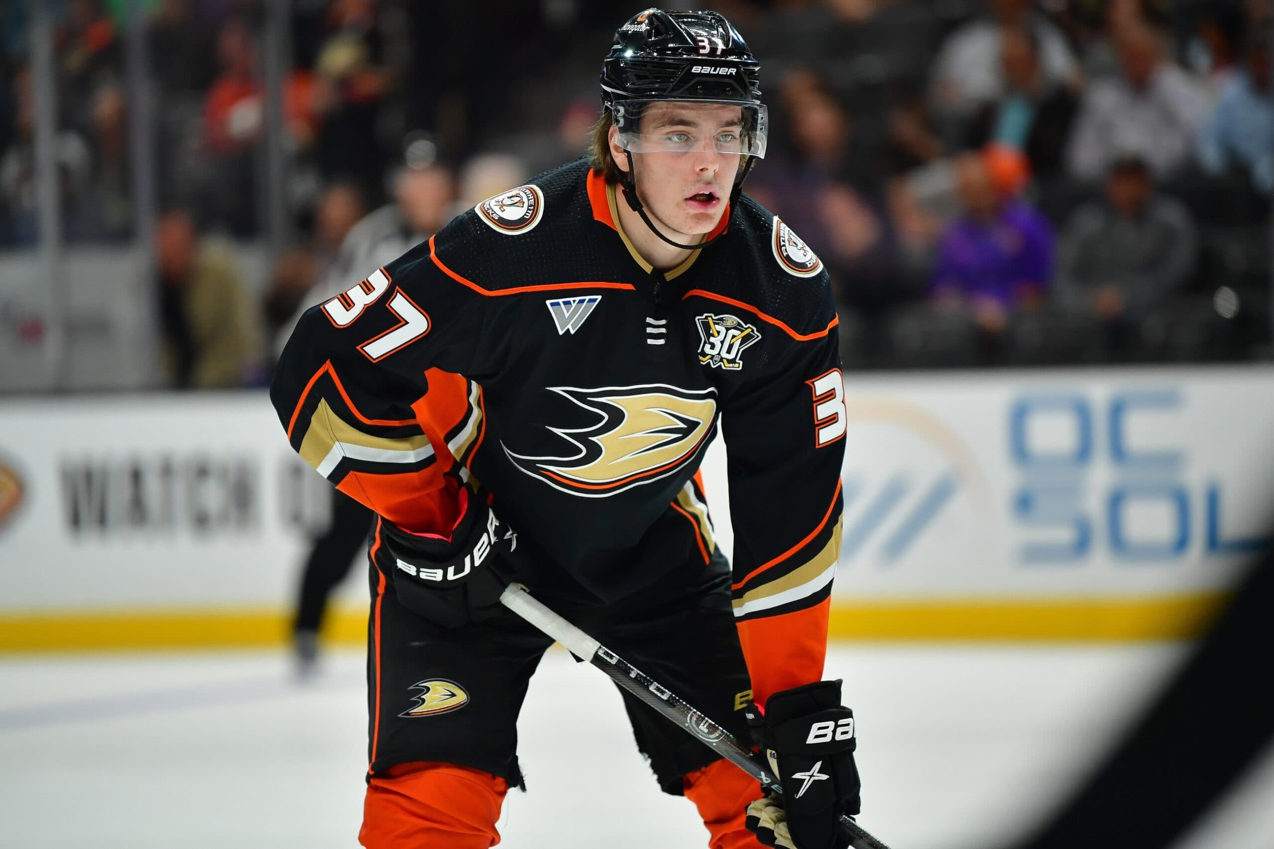 Leo Carlsson helped off the ice at Anaheim Ducks practice