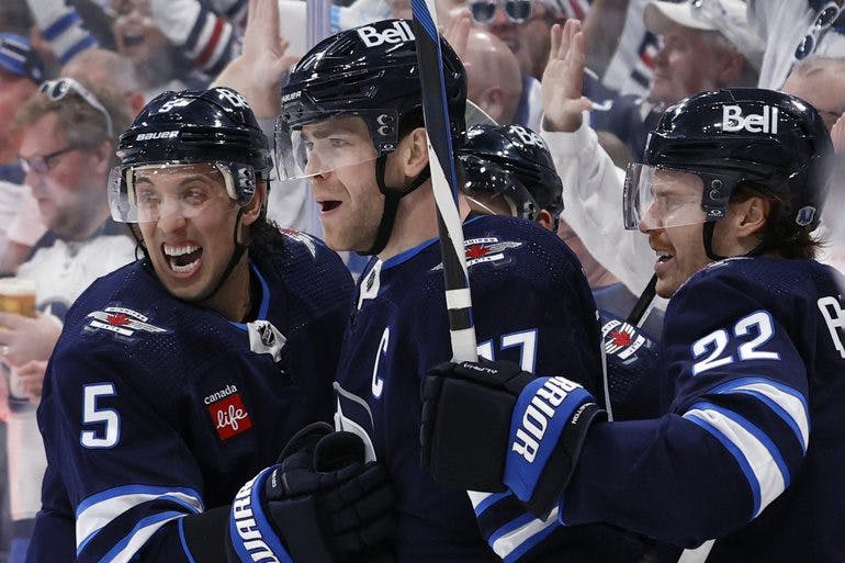 Stanley Cup Playoffs Day 2: Two-goal games from Lowry and Connor give Jets win in high-scoring Game 1