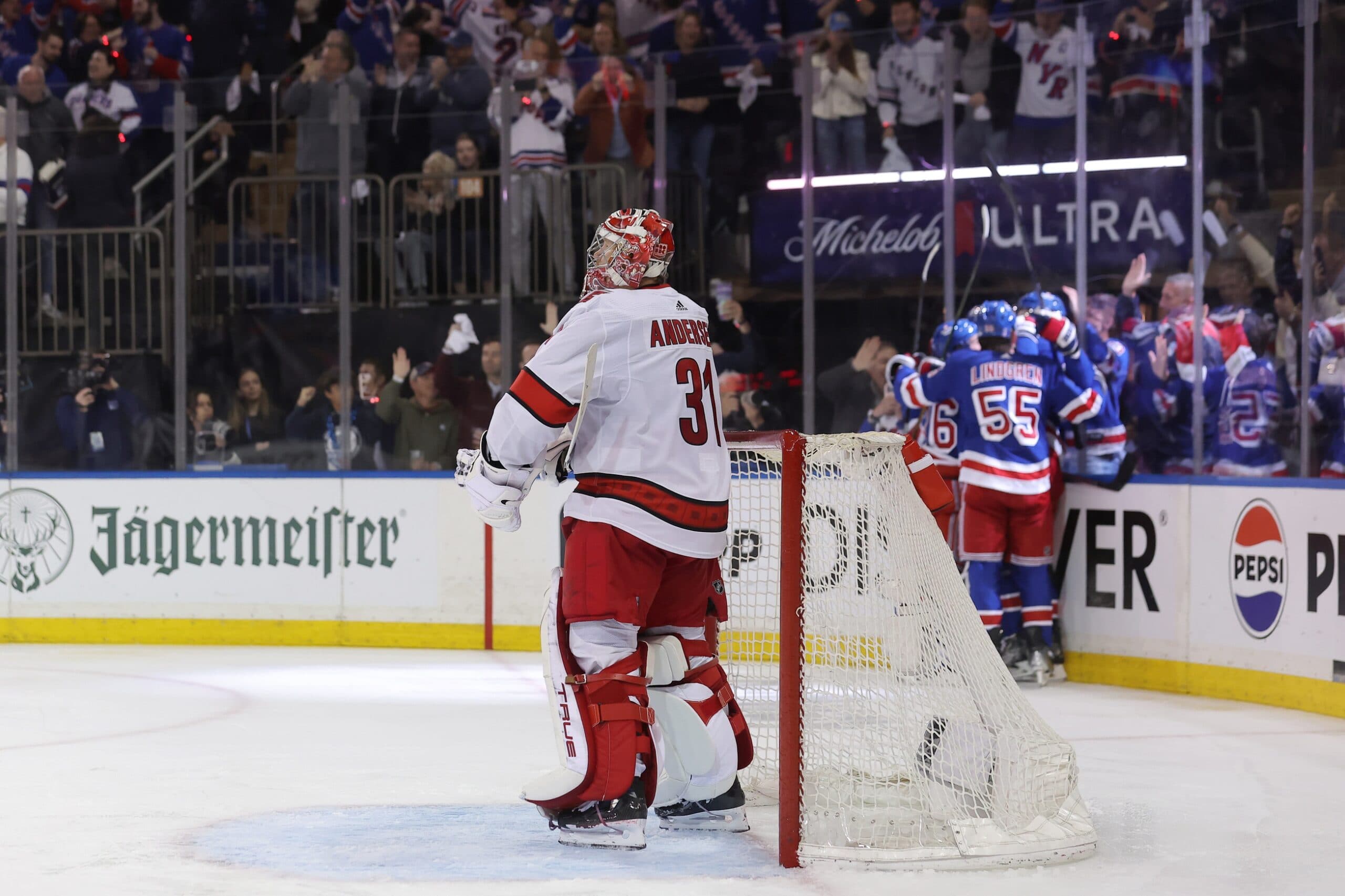 Carolina Hurricanes goaltender Frederik Andersen & New York Rangers players