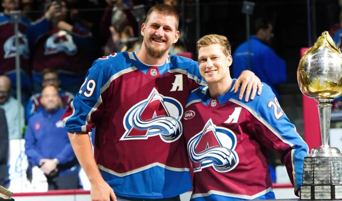 NBA 2024 MVP Nikola Jokic presents Avalanche’s Nathan MacKinnon with Hart Trophy
