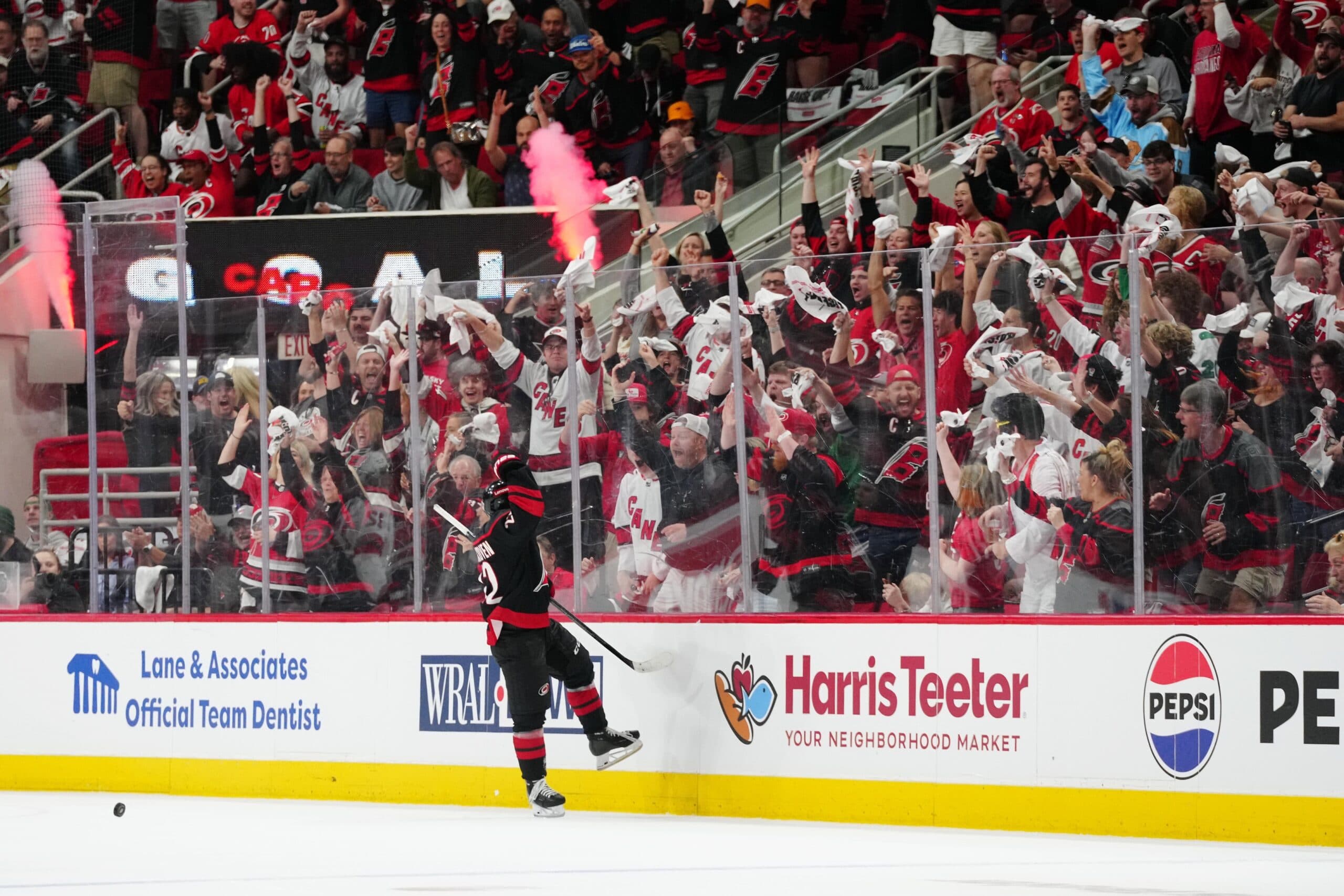 Carolina Hurricanes center Logan Stankoven (22) celebrates after scoring a goal against the New Jersey Devils during the second period of game one of the first round of the 2025 Stanley Cup Playoffs at Lenovo Center.