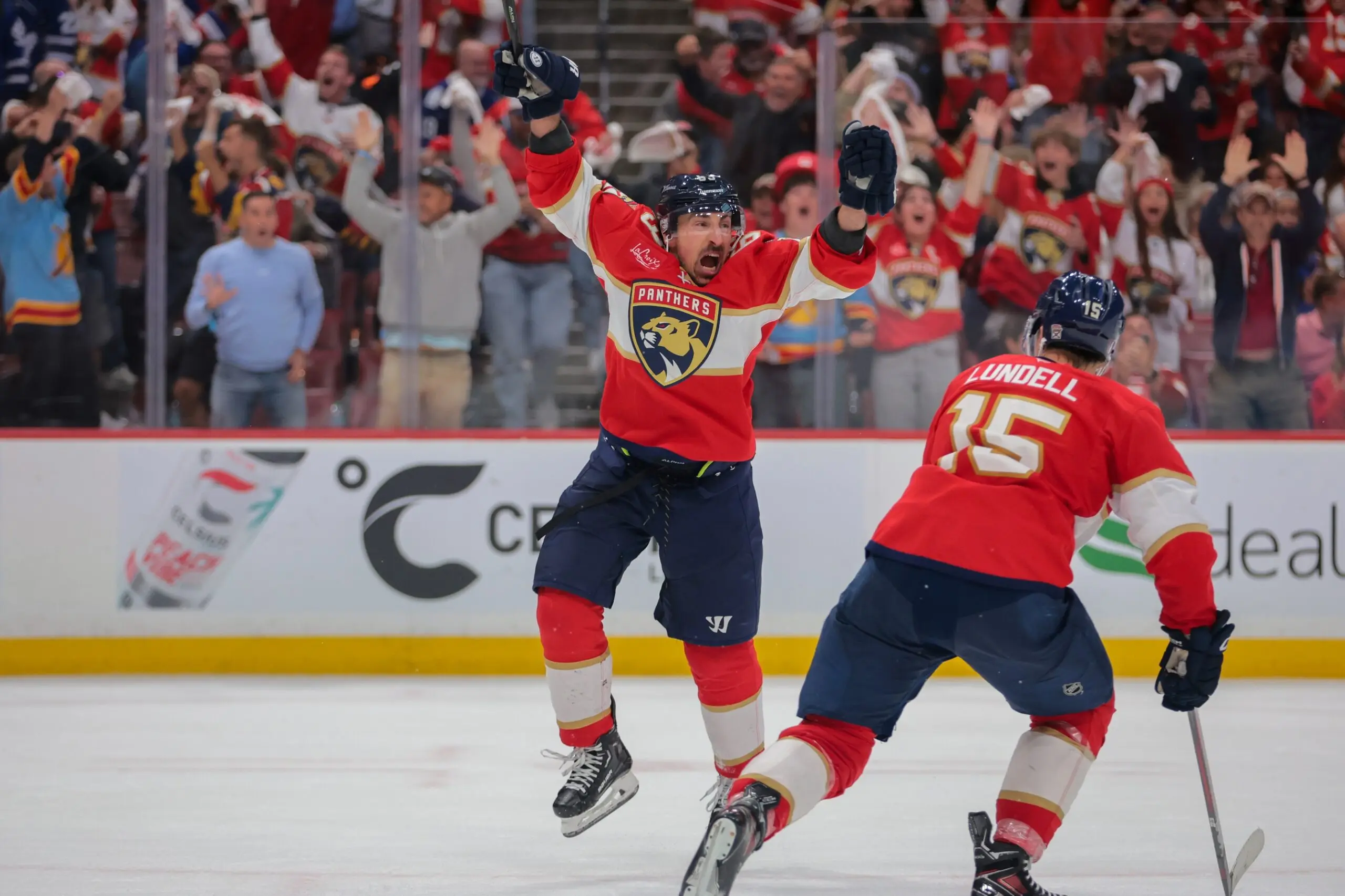 Florida Panthers center Brad Marchand (63) celebrates after scoring the game-winning goal against the Toronto Maple Leafs during overtime in game three of the second round of the 2025 Stanley Cup Playoffs at Amerant Bank Arena.