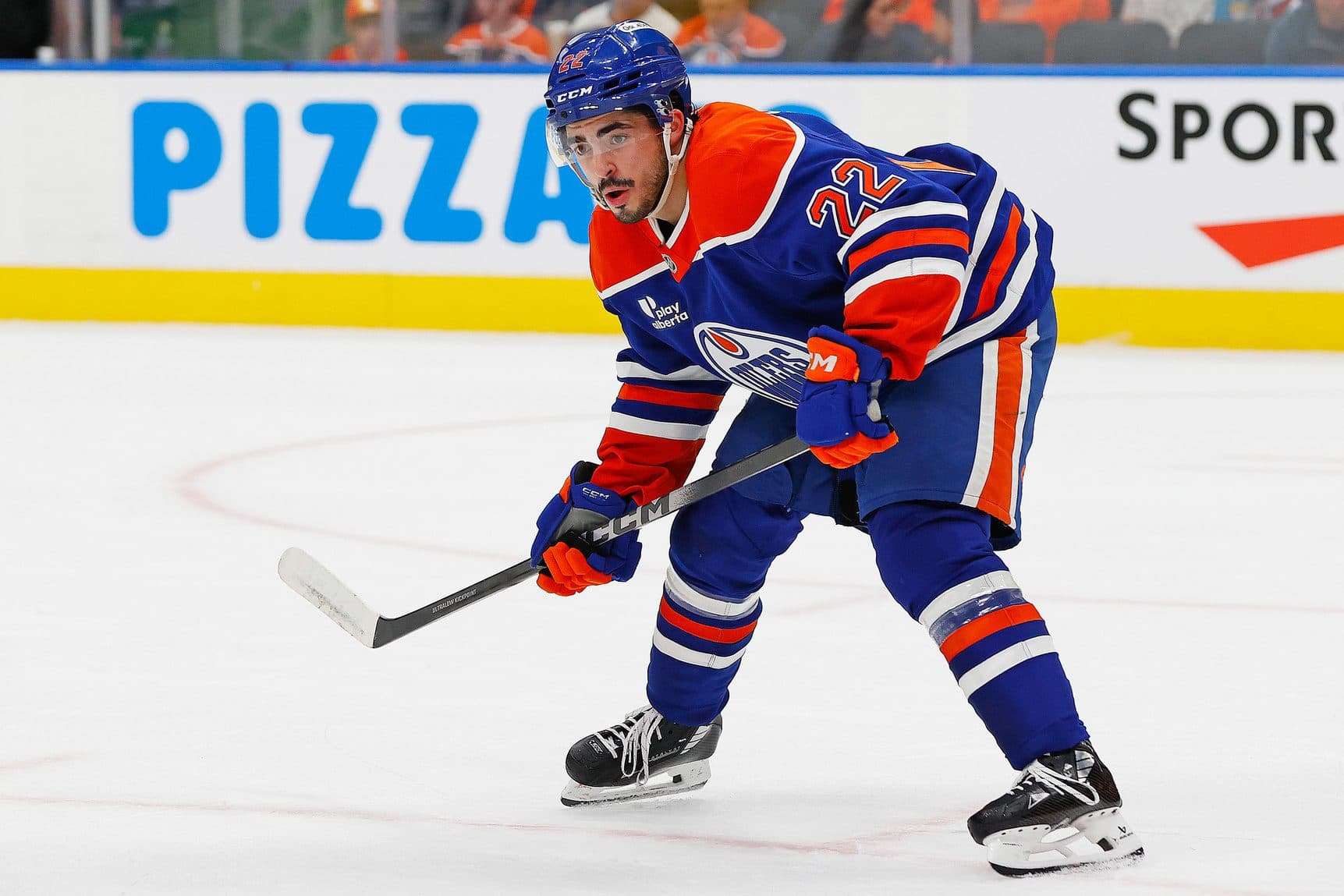 Edmonton Oilers Forward Matt Savoie (22) looks for a loose puck against the Calgary Flames at Rogers Place