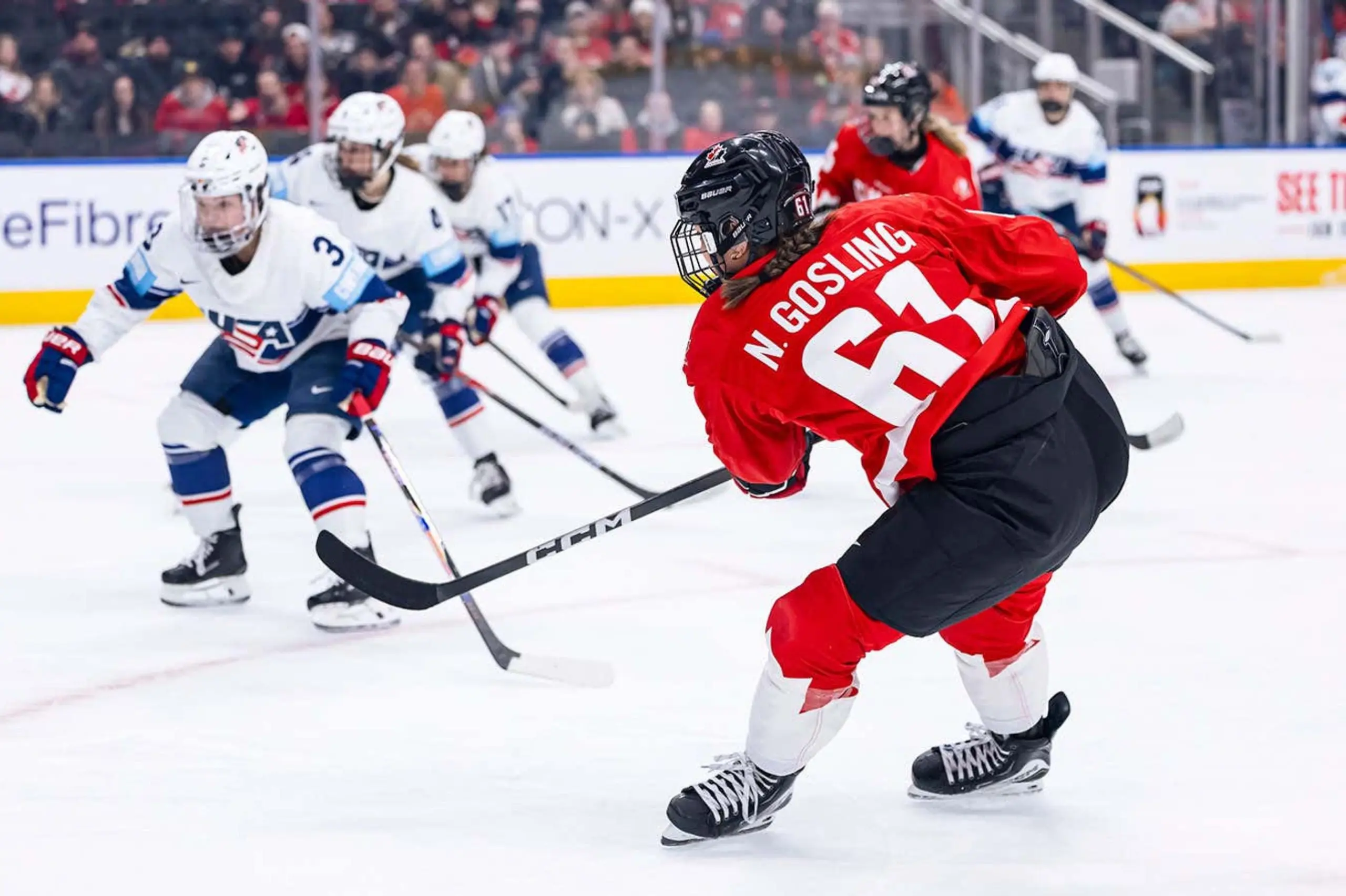 Who improved their stock to make Canada, USA women’s Olympic hockey teams?