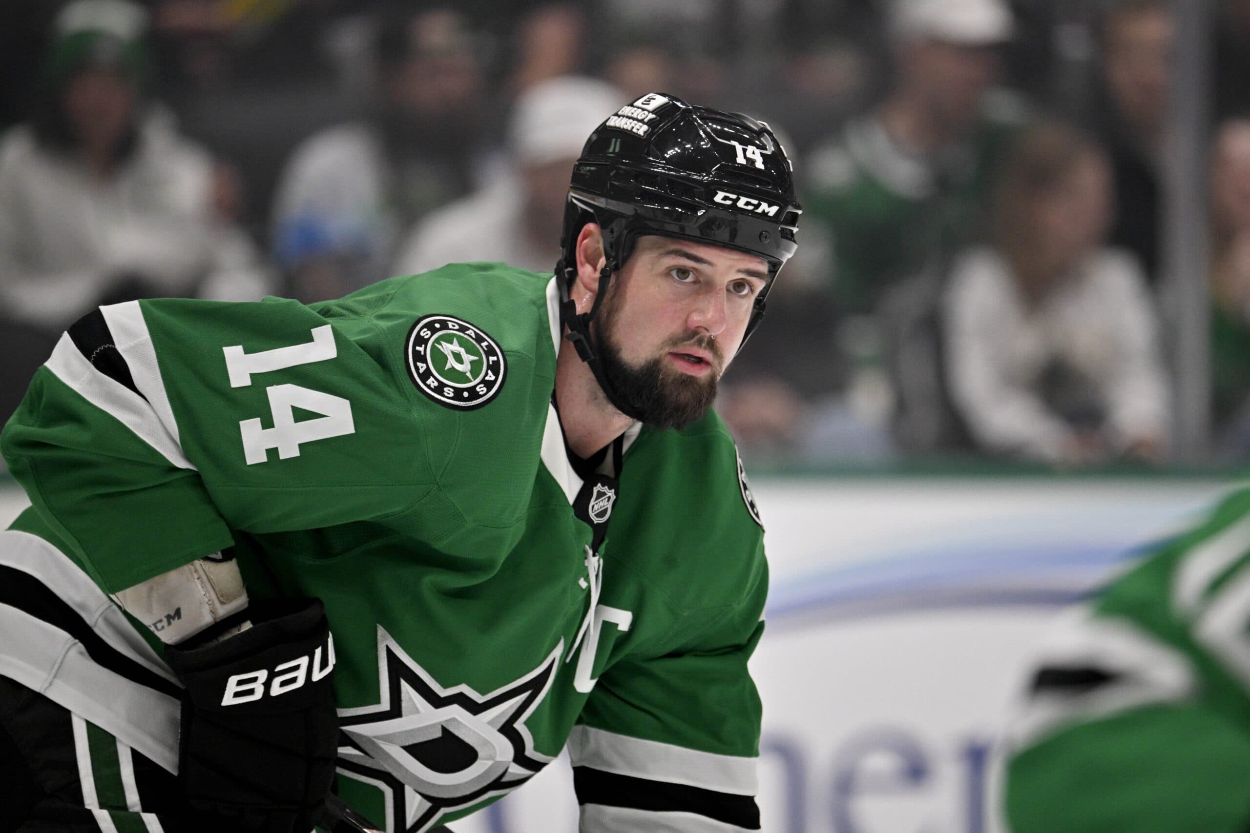 Dallas Stars left wing Jamie Benn (14) looks on during the face-off against the New York Islanders during the first period at the American Airlines Center.