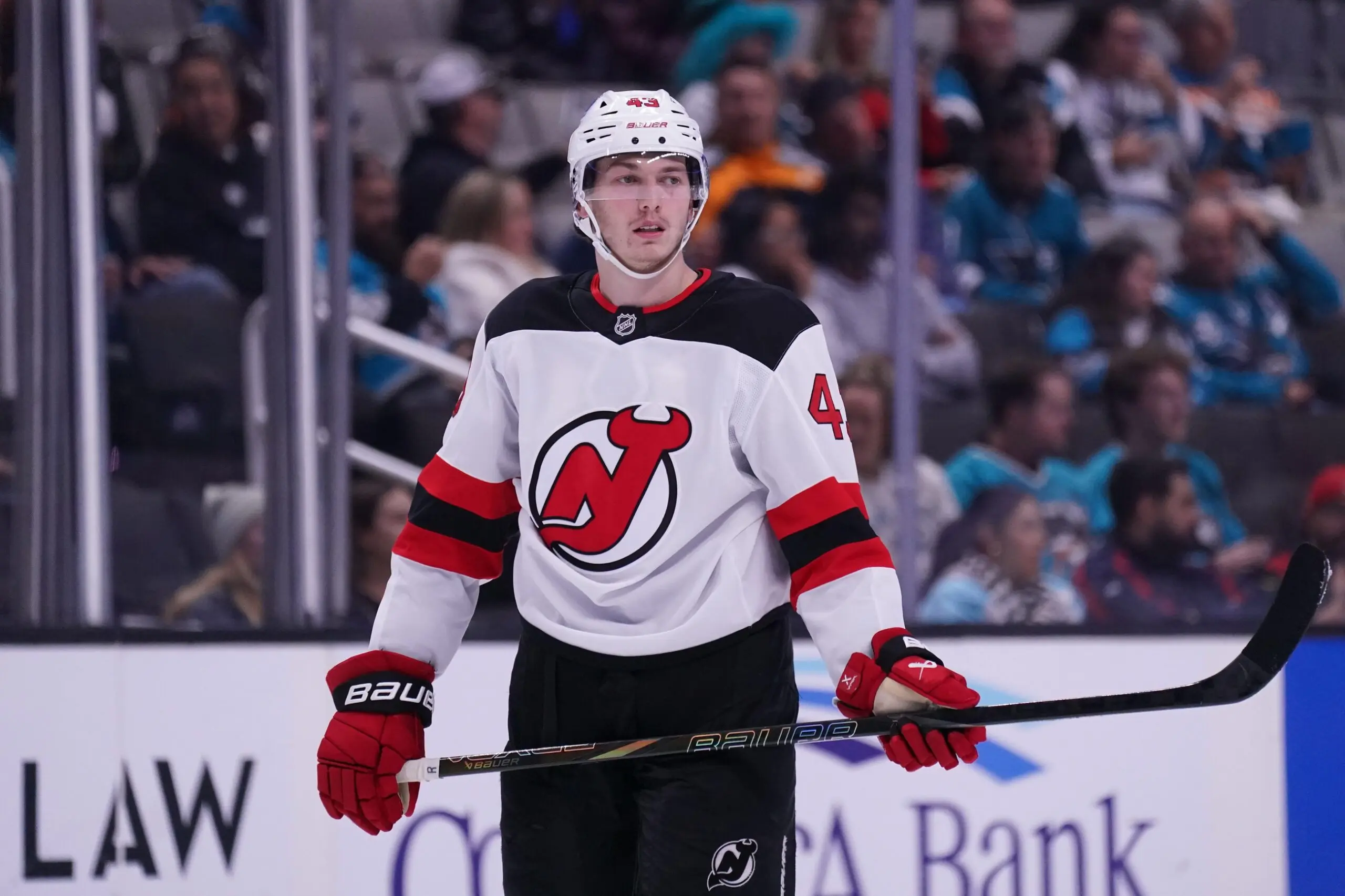 Report: Devils’ Luke Hughes dislocates shoulder against Flames