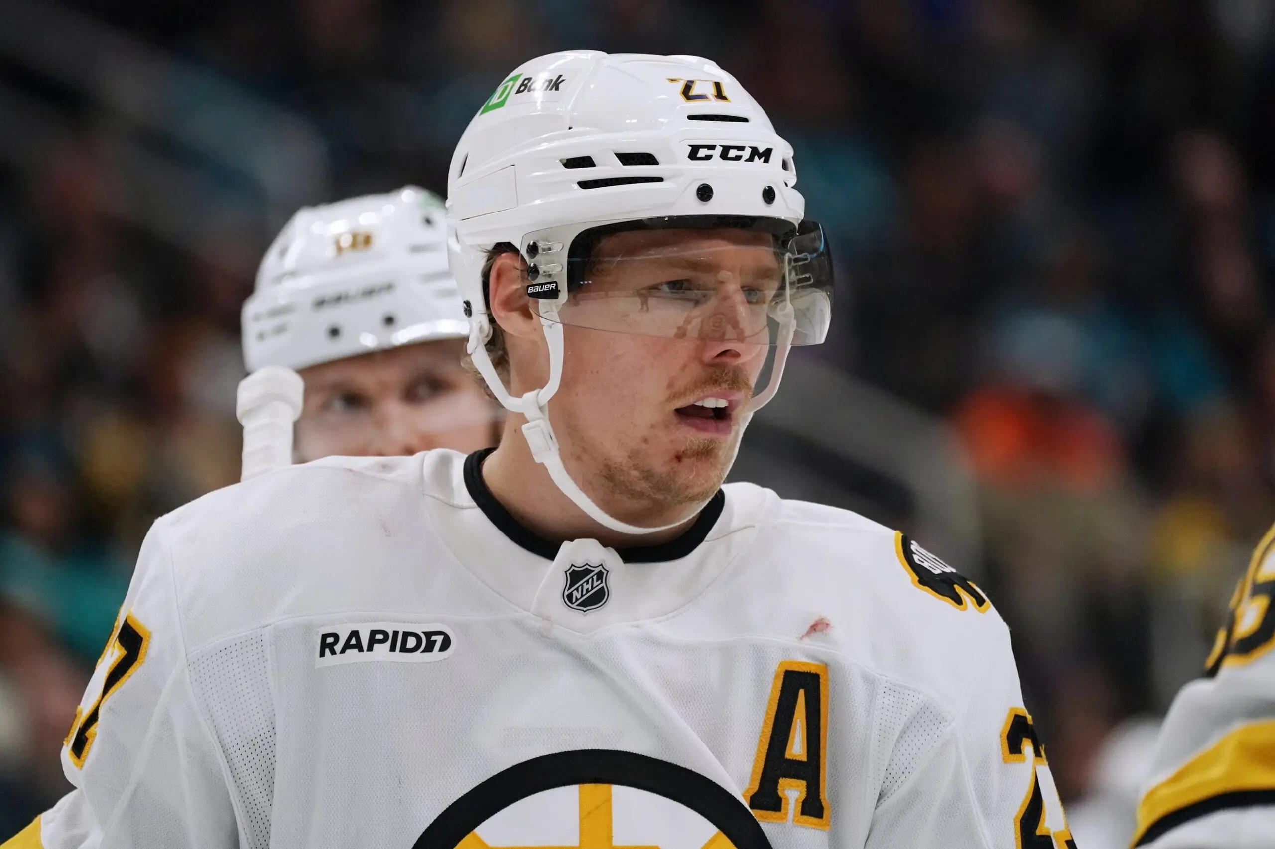 Boston Bruins defenseman Hampus Lindholm (27) waits for play to resume against the San Jose Sharks in the third period at SAP Center in San Jose.