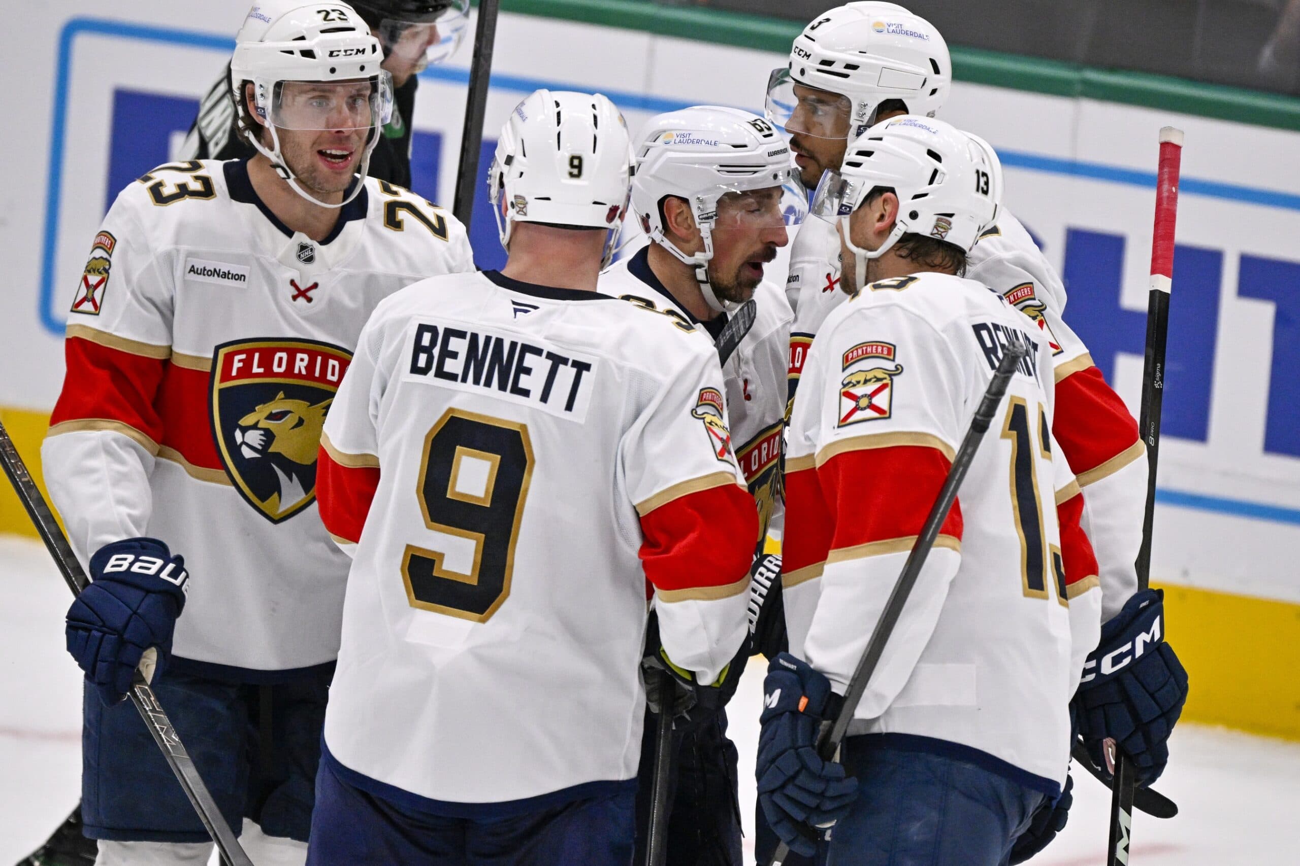 Florida Panthers center Carter Verhaeghe (23) and center Sam Bennett (9) and left wing Brad Marchand (63) and defenseman Seth Jones (3) and center Sam Reinhart (13) celebrates a power play goal scored by Marchand against the Dallas Stars during the second period at the American Airlines Center.