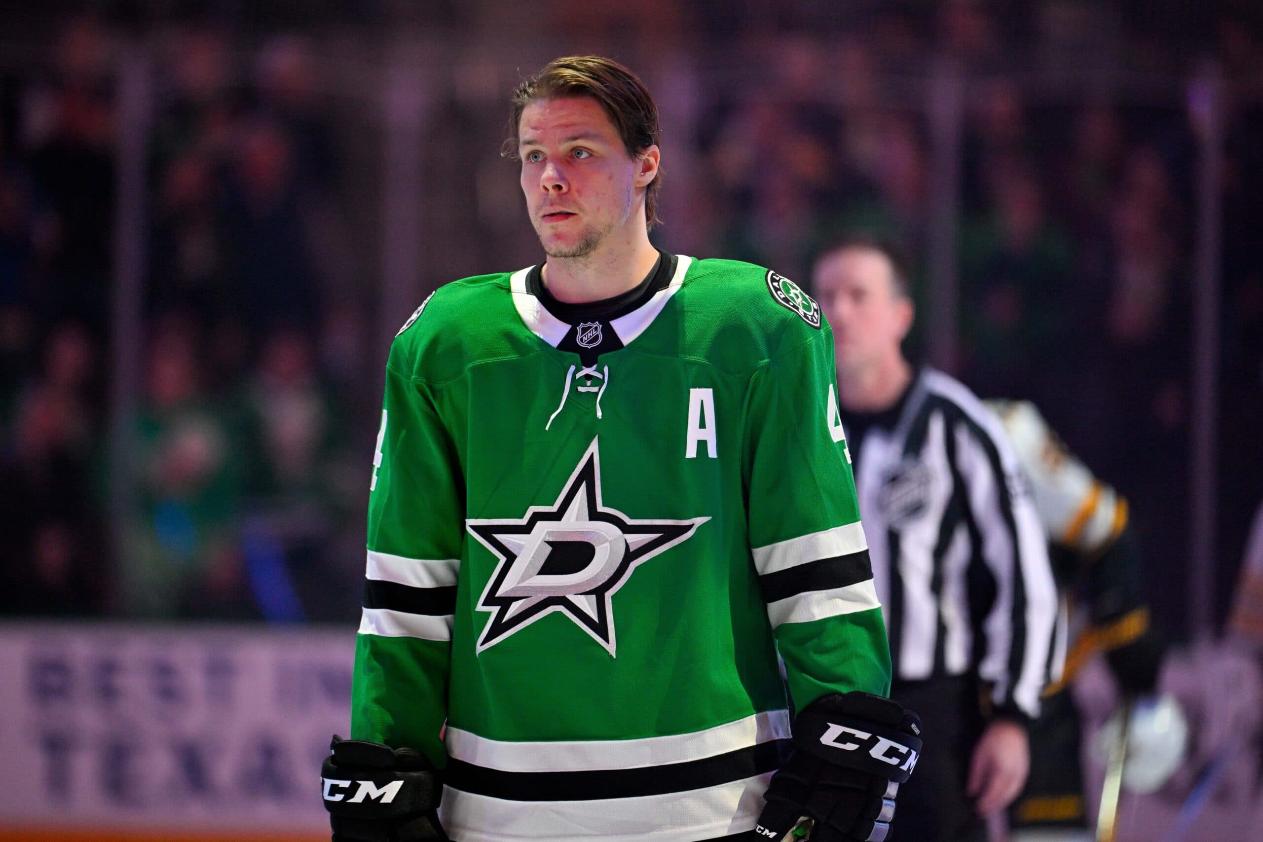 Dallas Stars defenseman Miro Heiskanen (4) looks on before the game between the Dallas Stars and the Boston Bruins at the American Airlines Center.