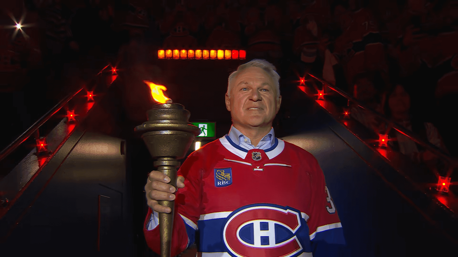 Claude Lemieux carrying the torch at the Bell Centre ahead of Game 3 of the Eastern Conference Final.