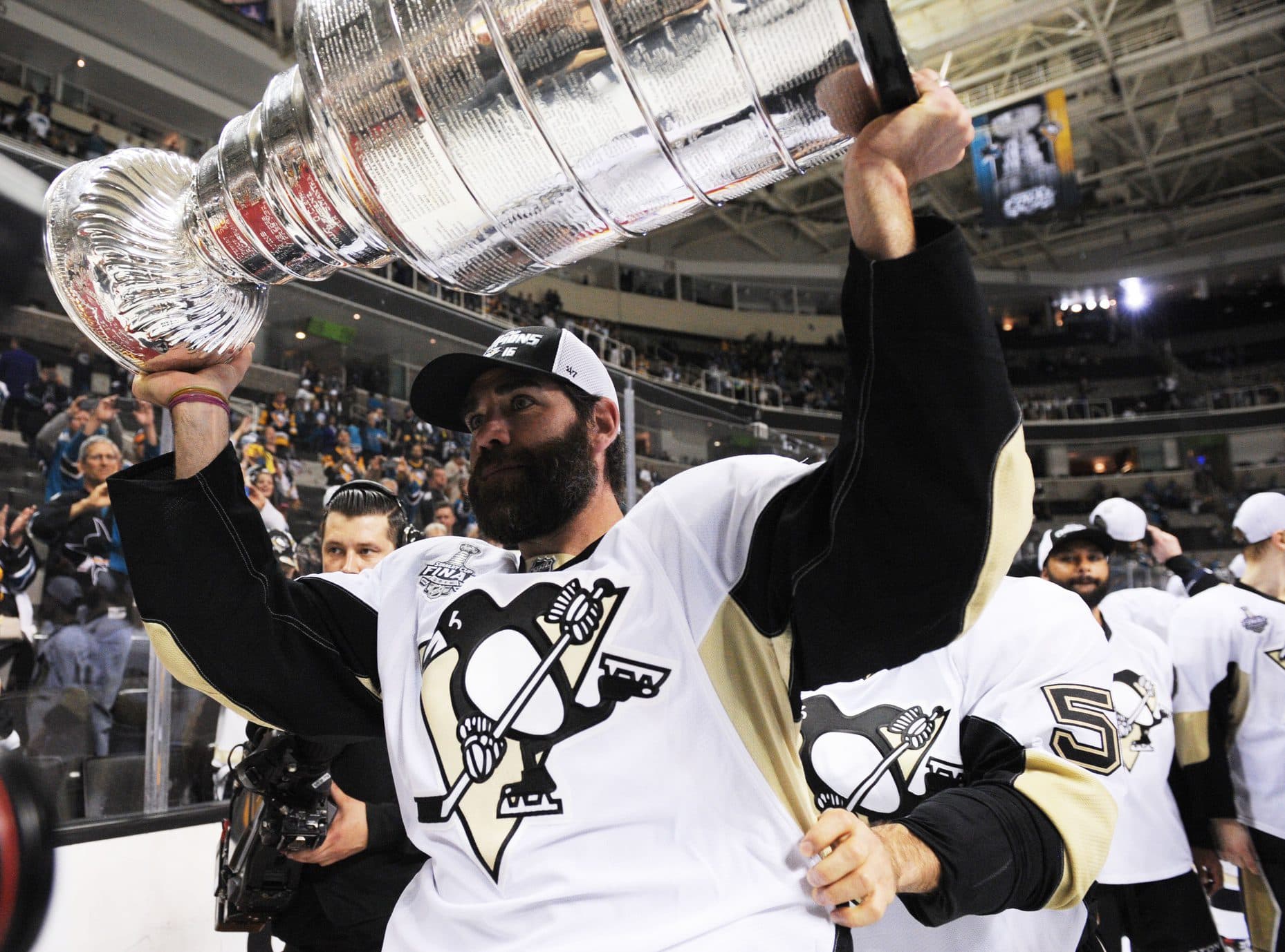 Pittsburgh Penguins player Pascal Dupuis hoists the Stanley Cup after defeating the San Jose Sharks in game six of the 2016 Stanley Cup Final at SAP Center at San Jose.