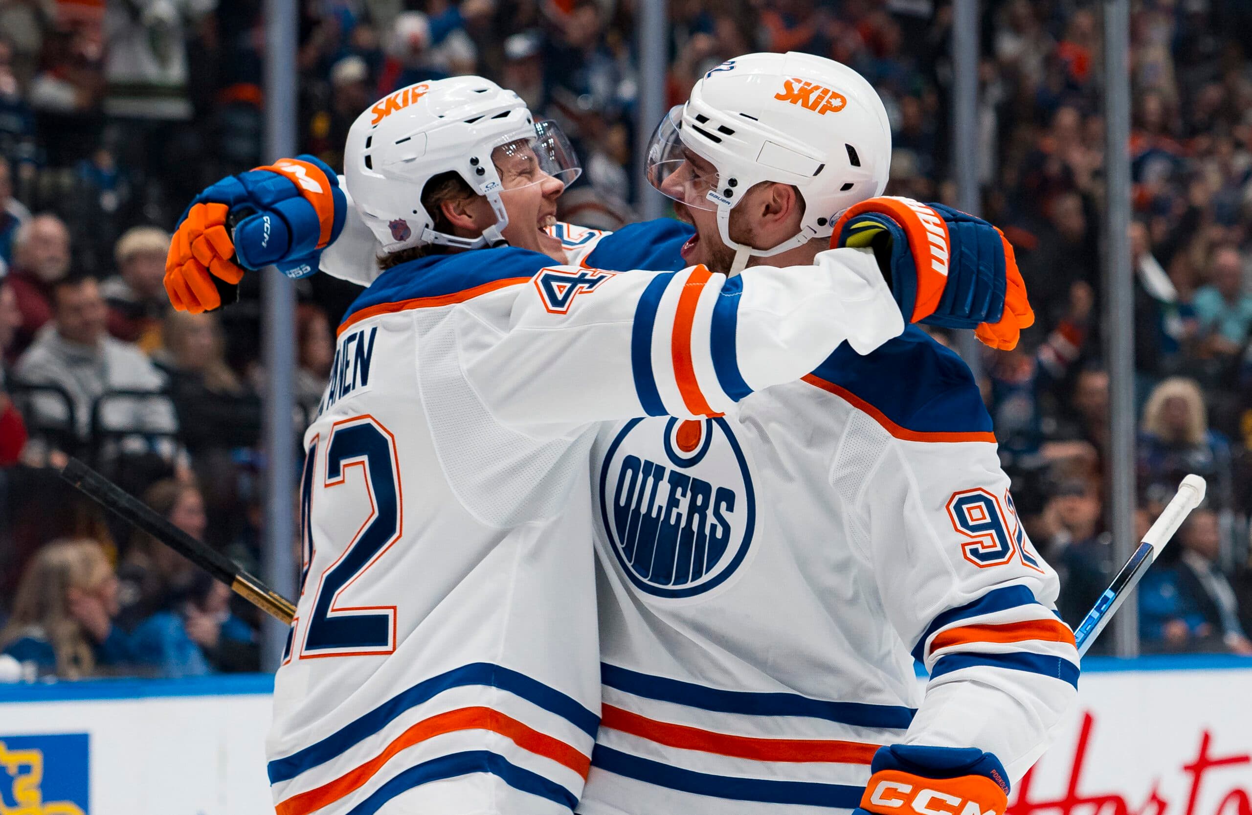 Edmonton Oilers forward Kasperi Kapanen (42) and forward Vasily Podkolzin (92) celebrate Podkolzin's goal against the Vancouver Canucks in the first period at Rogers Arena.