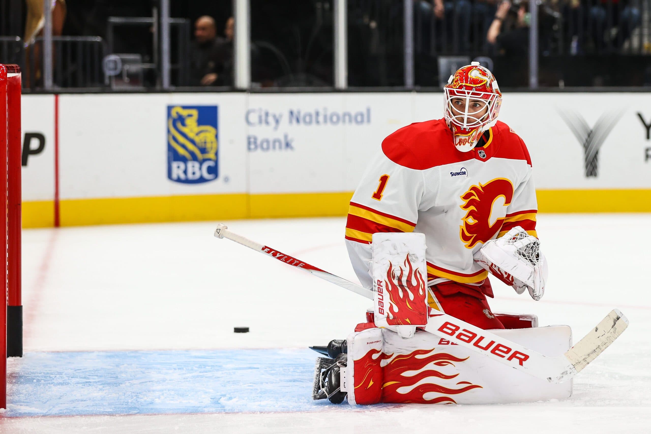 Flames’ Devin Cooley exits game with lower-body injury